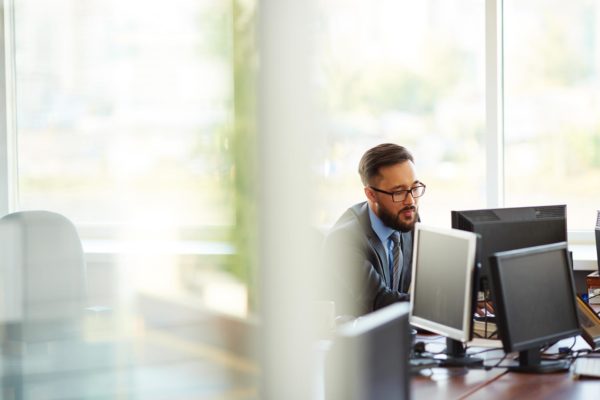 Asian businessman working alone in office